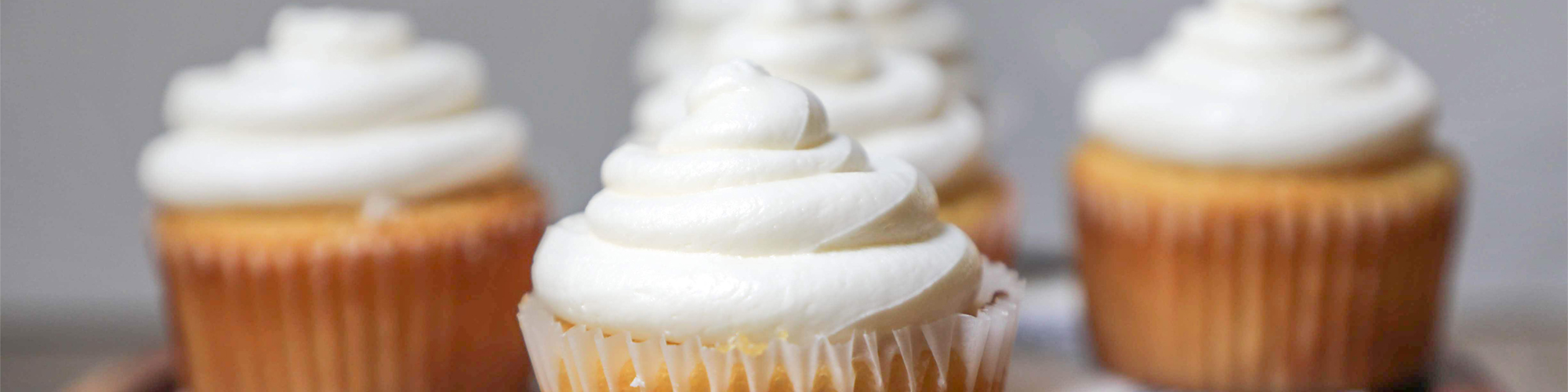 vanilla cupcakes with Domino® Sugar buttercream frosting