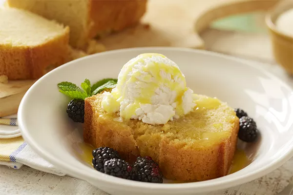 domino golden sugar pound cake with warm lemon sauce and vanilla ice cream