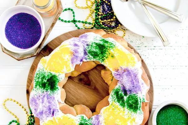 king cake made with domino granulated sugar and powdered sugar