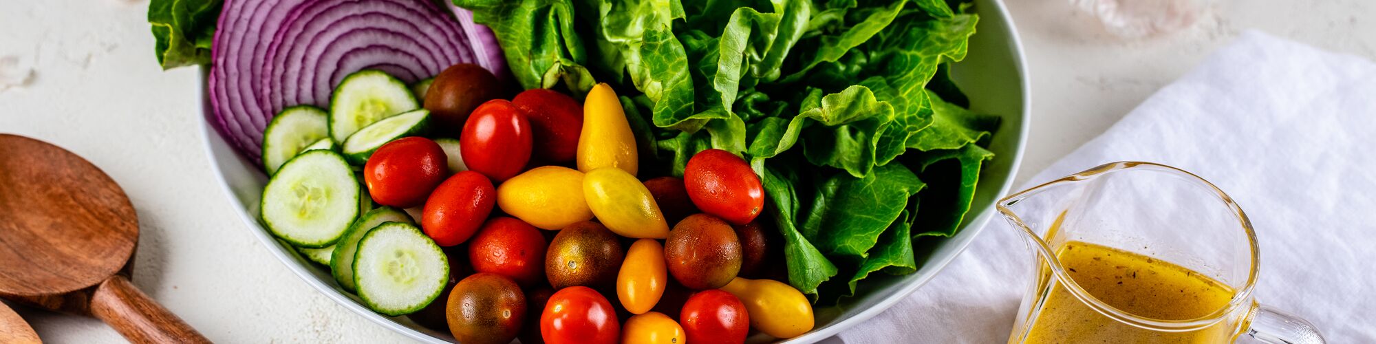 fresh salad and champagne vinaigrette made with Domino® Sugar