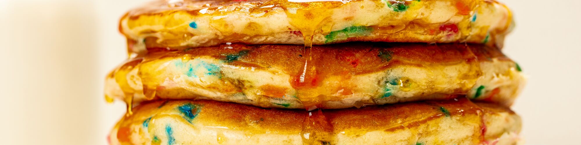 confetti pancakes made with domino golden sugar, turbinado syrup and whipped cream