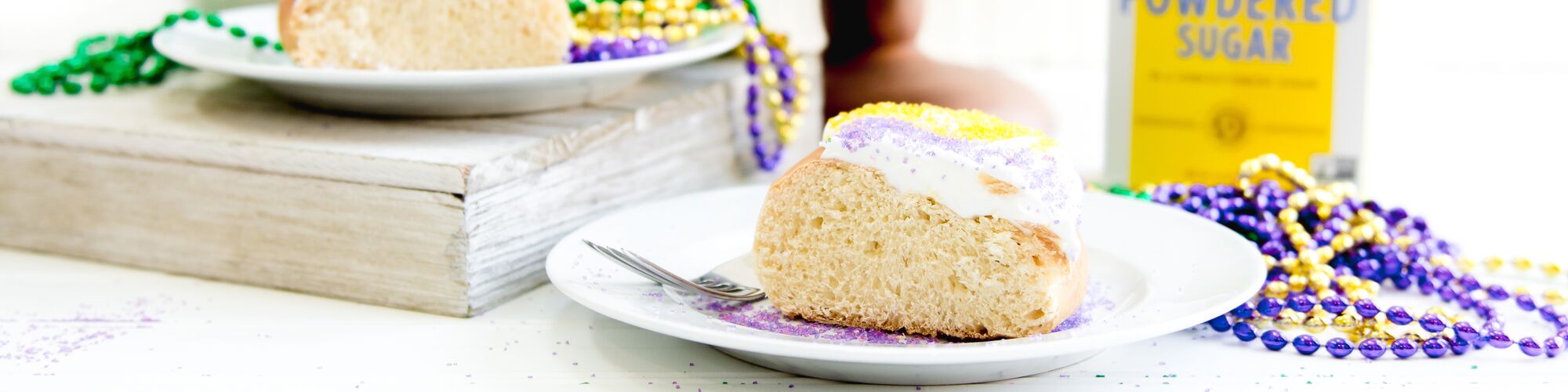 mardi gras king cake with Domino® Powdered Sugar