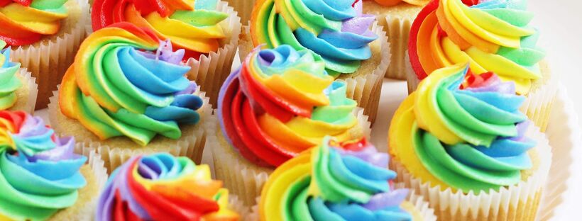  Domino® Sugar classic vanilla cupcakes with rainbow frosting