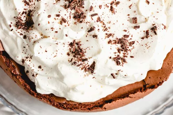 flourless chocolate cake baked with domino golden sugar and powdered sugar whipped topping