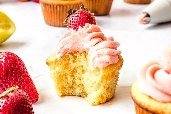 LEMON CUPCAKES WITH STRAWBERRY BUTTERCREAM FROSTING