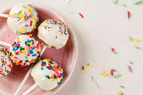 no bake birthday cake pops made with domino dark brown sugar and powdered sugar