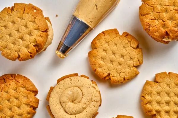 peanut butter cookie sandwich with peanut butter filling made from domino powdered sugar