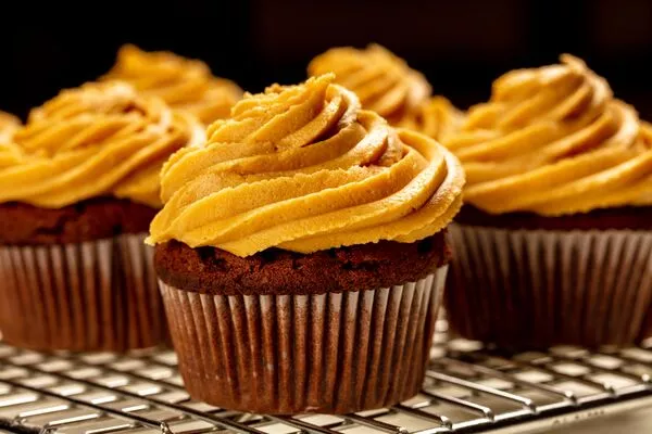 cupcakes with peanut butter frosting made with domino powdered sugar