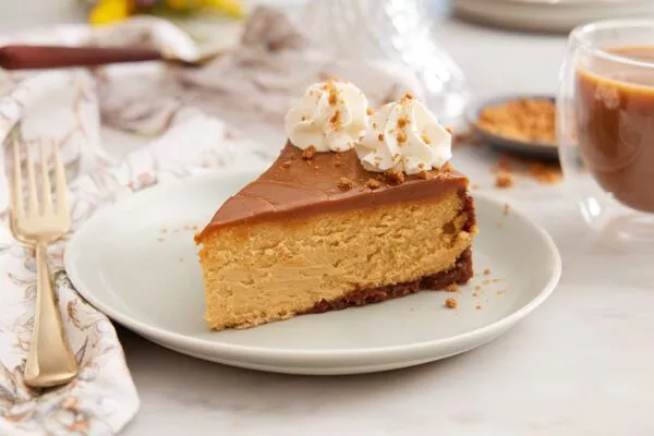 slice of pumpkin dulce de leche cheesecake with domino dark brown sugar
