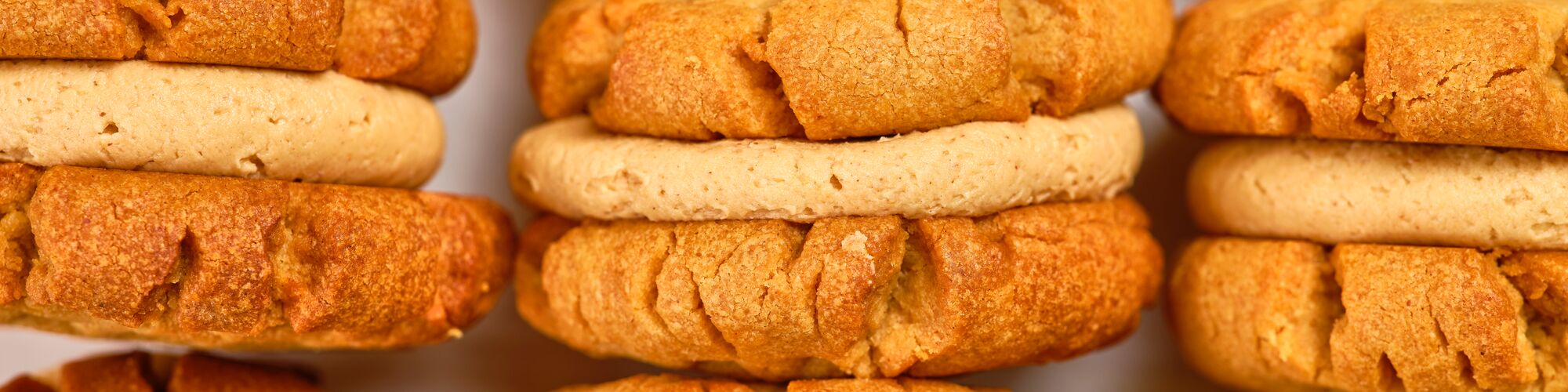 peanut butter cookie sandwich with peanut butter filling made from domino powdered sugar