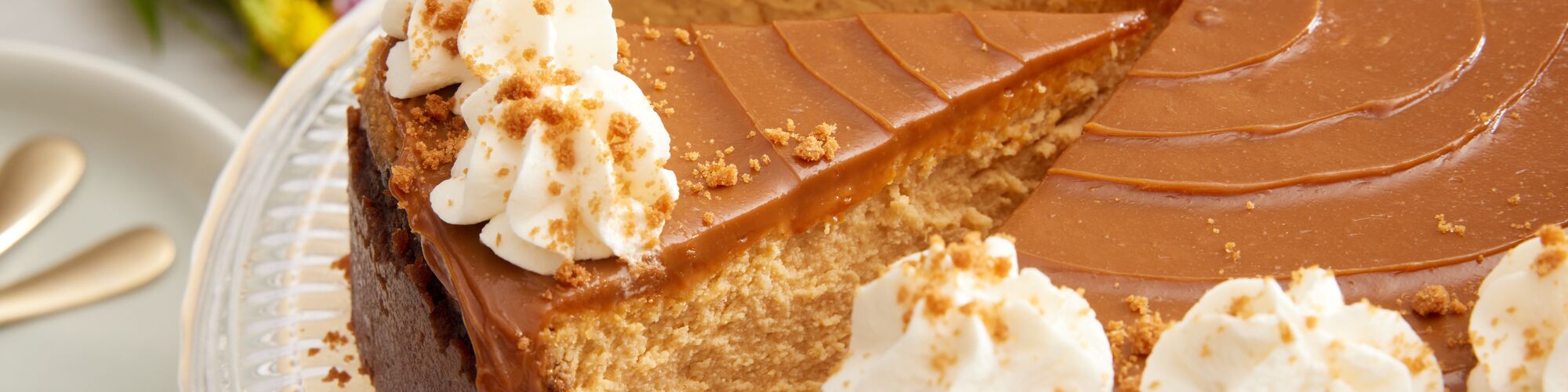 slice of pumpkin dulce de leche cheesecake with domino dark brown sugar