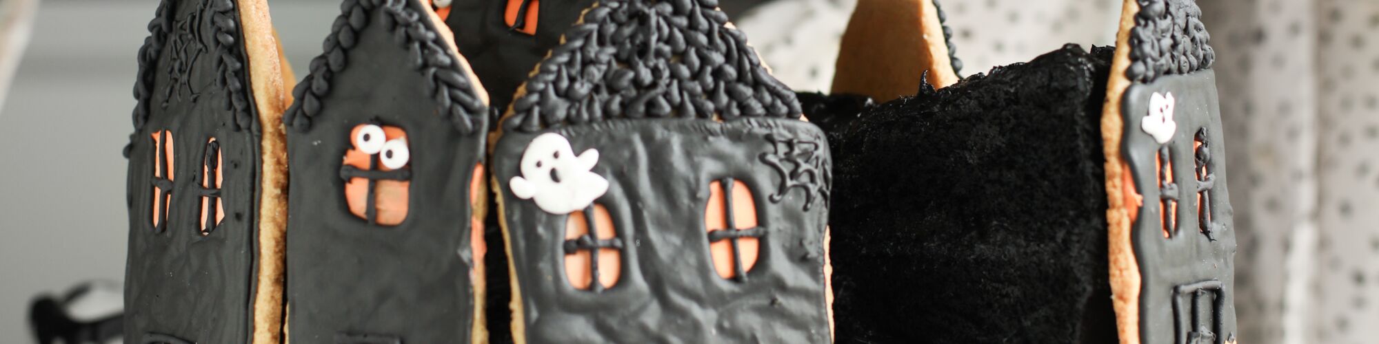 spooky gingerbread house cake with domino dark brown sugar