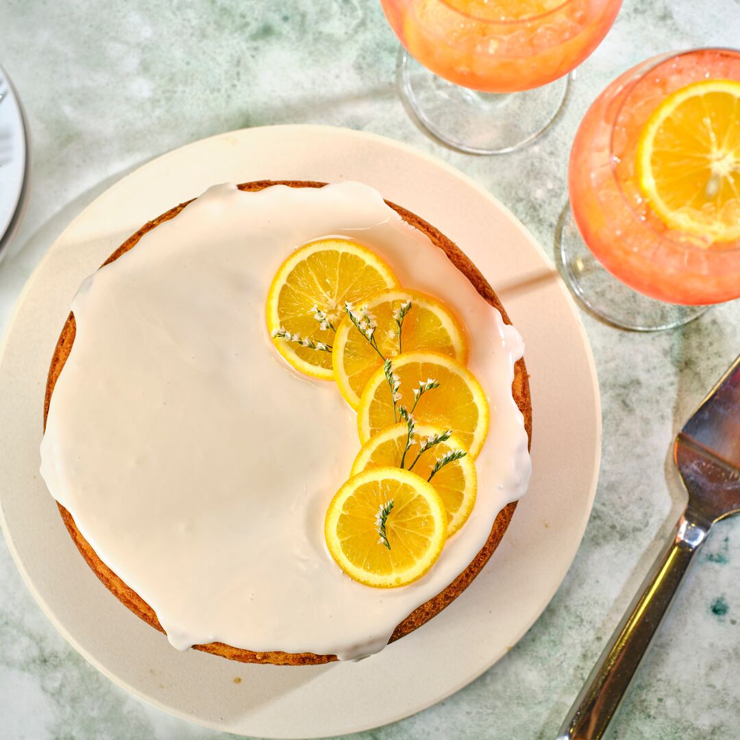 Olive Oil Cake with Aperol Spritz Powdered Sugar Glaze