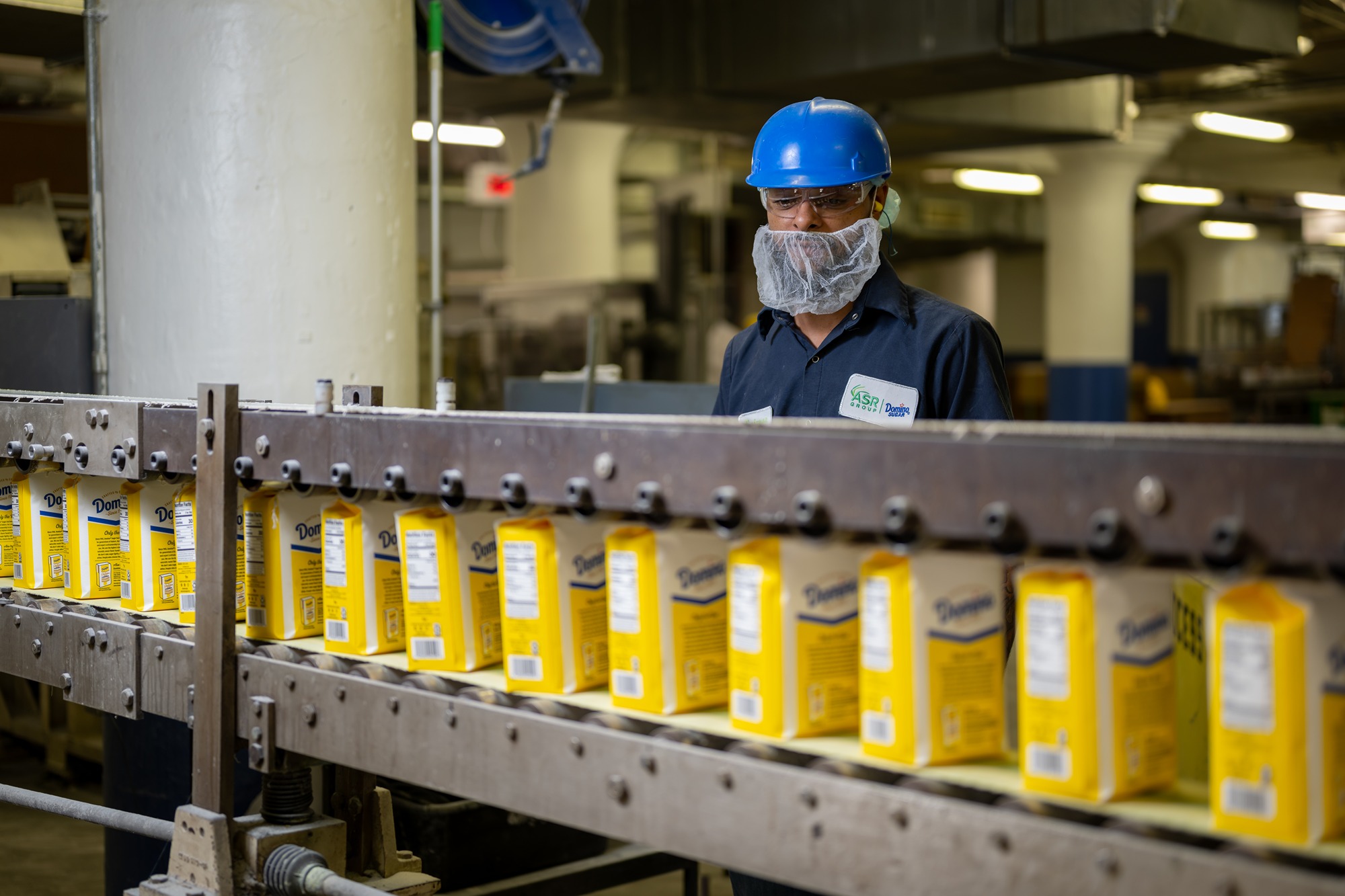 Domino® Granulated Sugar packages in refinery