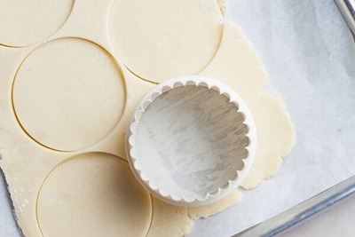 gluten free handpie dough flattened and cut into circles with cookie cutter